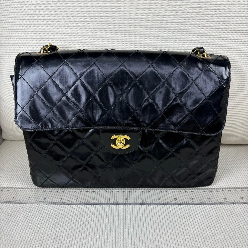 CHANEL Black Quilted Bag with Gold Chain - Picture 16 of 16